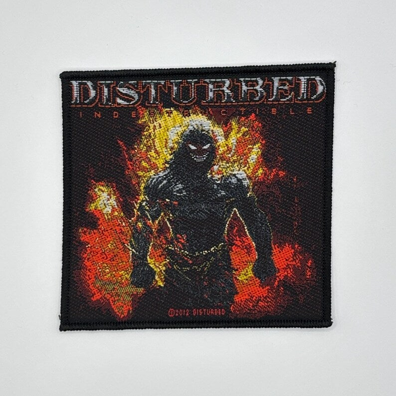 Disturbed Aufnäher INDESTRUCTIBLE Patch 9,5 x 9,5 cm - Nu Metal Band Merch Gewebt - Kutte Jacke Rucksack Deko The Guy Motiv