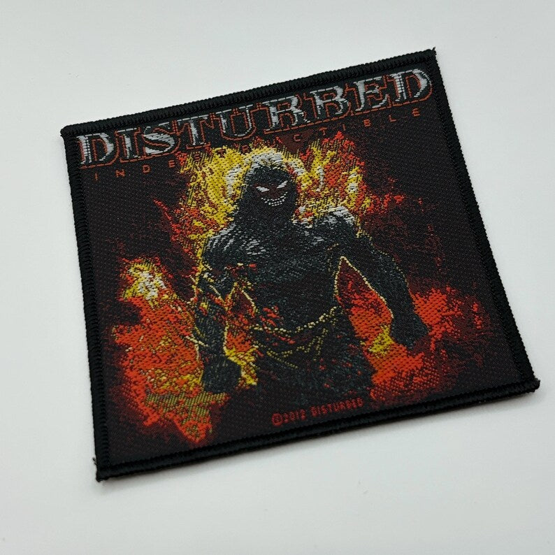 Disturbed Aufnäher INDESTRUCTIBLE Patch 9,5 x 9,5 cm - Nu Metal Band Merch Gewebt - Kutte Jacke Rucksack Deko The Guy Motiv